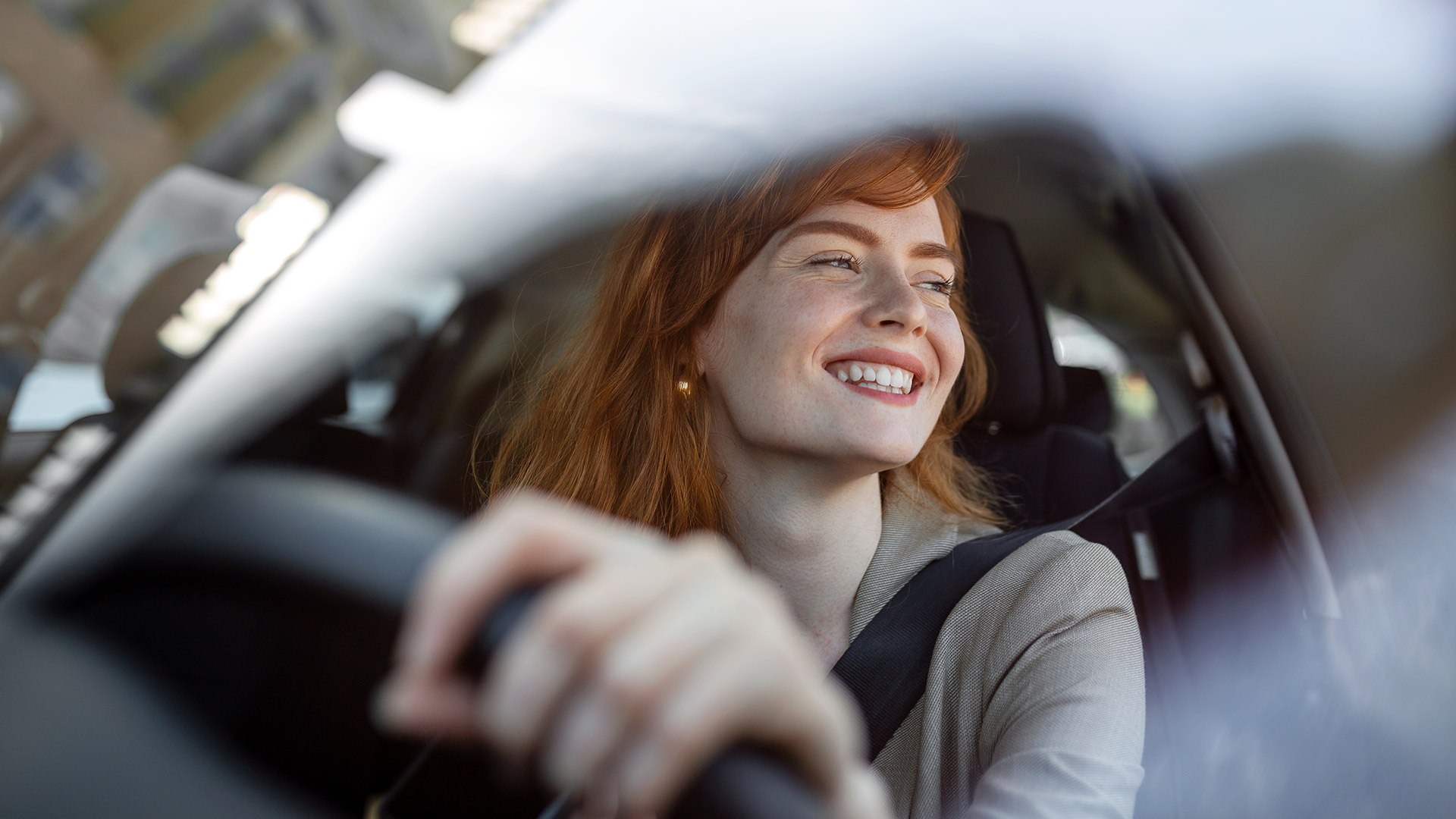 Electric-Car-Woman-Driving-Window-Happy-ORIGINAL